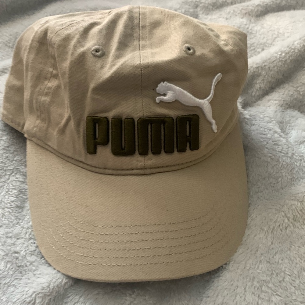 Tan puma hat adjustable hardly ever worn
